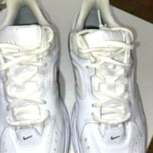 White Nike cross-training sneakers